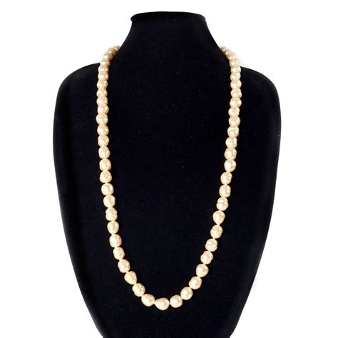 collier de perles chanel|chanel collier homme.